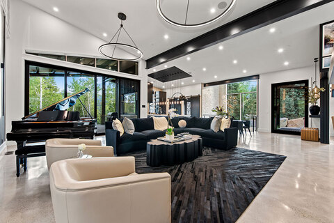 Down to Earth Projects | Park City Parade with Riverwood Interiors - large modern family room and grand piano in park city home 