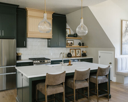 Down to Earth Projects | Utah Valley Parade at The Legacy at Meadow Ridge - green cabinets with island and barstools from Down to Earth 