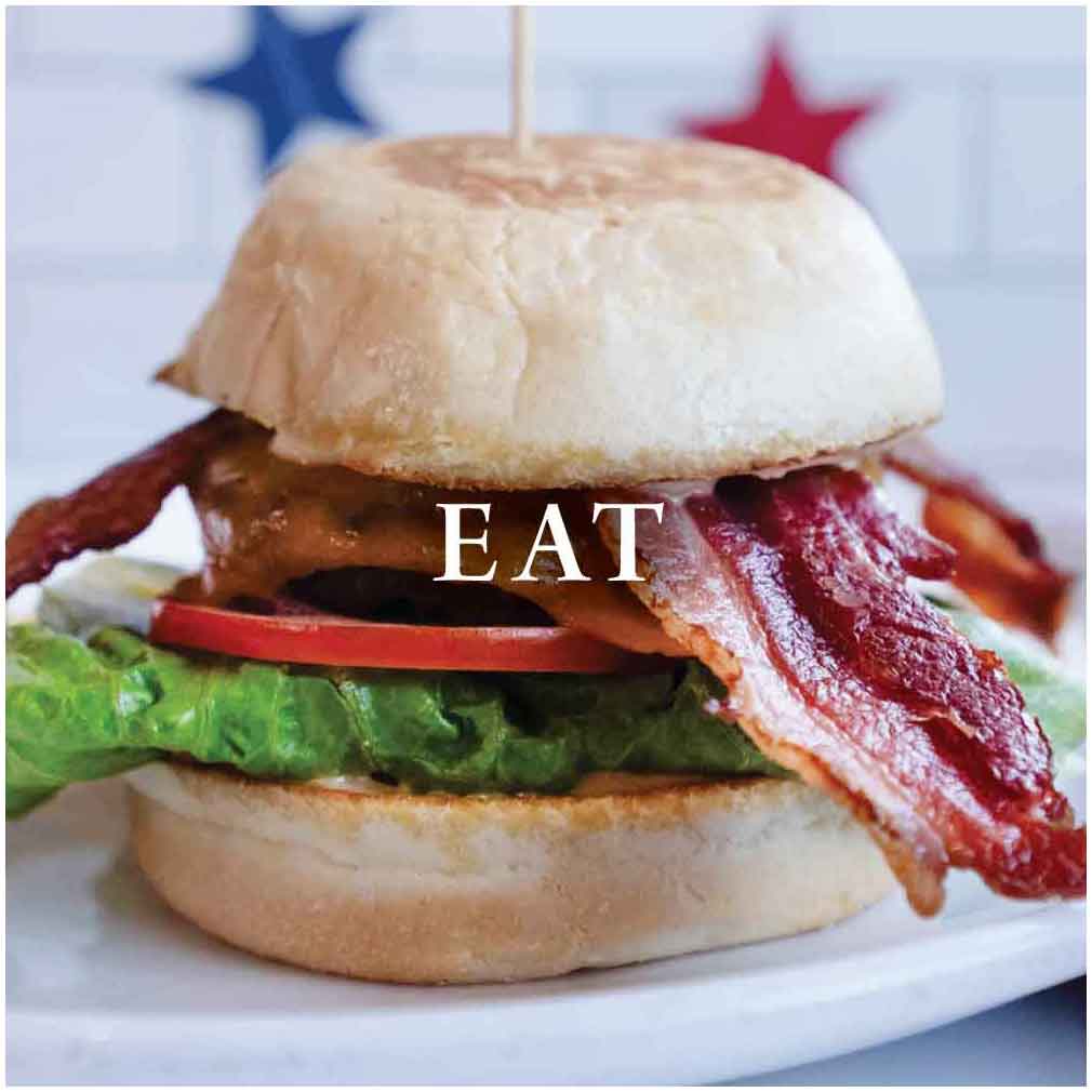 eat a hamburger at archibalds restaurant